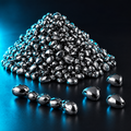 Pile of glossy black-silver sensory stones, a few linked in a chain